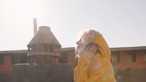 blonde woman on a terrace