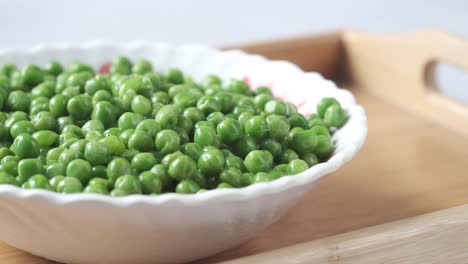 freshly cooked green peas in a bowl