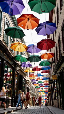 colorful street scene with hanging umbrellas