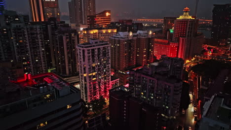 a view of a city at night from the top of a building