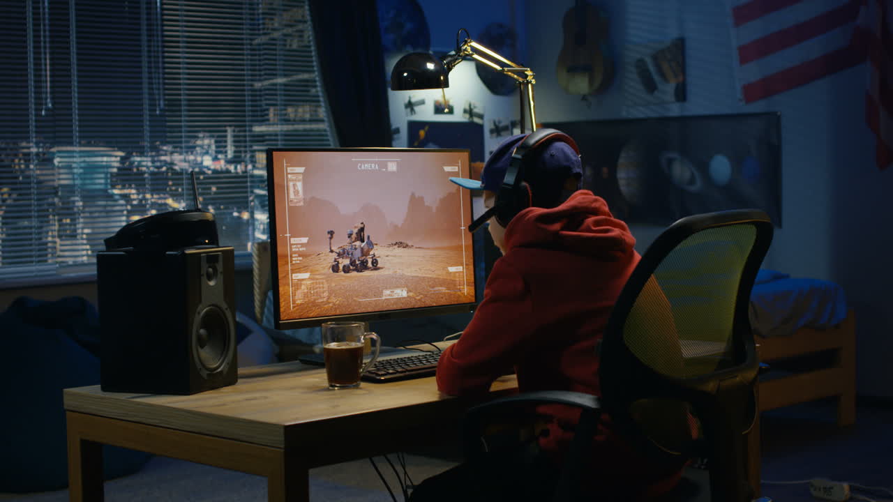 Teenager Playing Space Exploration Video Game