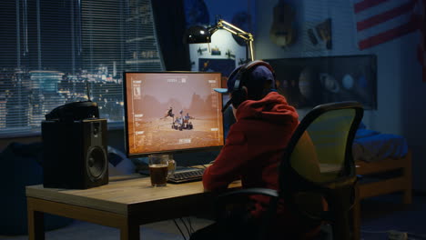 teenager playing space exploration video game