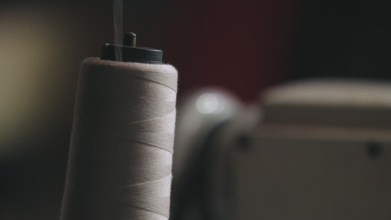 Static Shot Of Spool Thread On A Sewing Machine