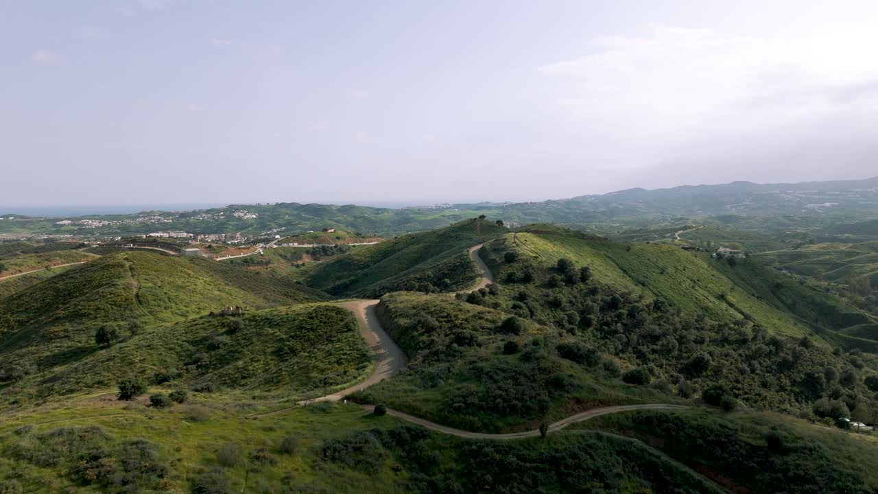Scenic aerial panorama highlighting the rugged and rocky mountain terrain of Marbella, Spain, taken from a high altitude.