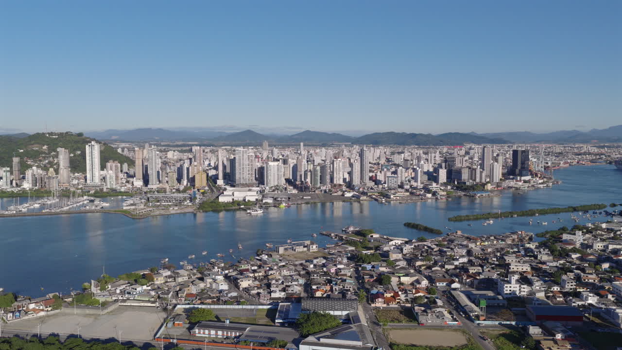 Aerial view of Itajaí city, Brazil, urban growth and infrastructure investment, expanding residential areas, Santa Catarina
