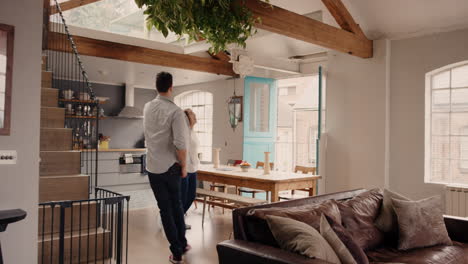 excited young couple exploring new home together