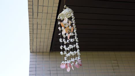 a hanging floral arrangement sways gently.