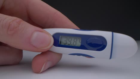 Macro-shot-of-thermometer-showing-high-temperature