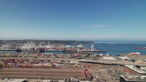 massive shipping seaport in seattle, washington, harbor island, 4k aerial