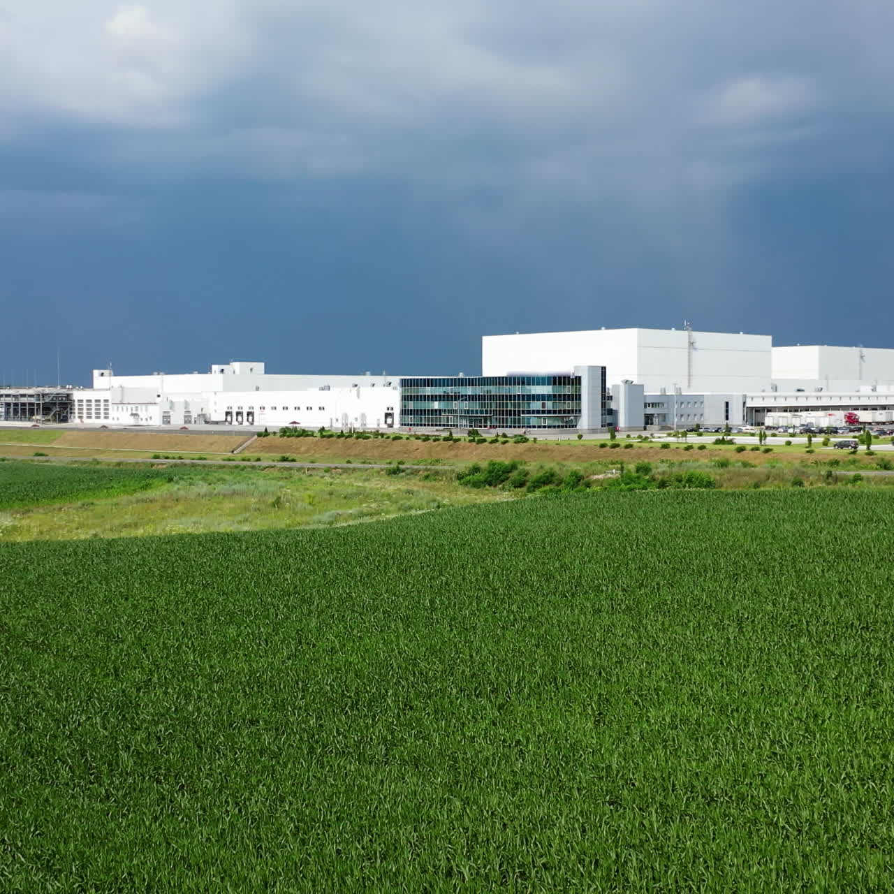 Industry Building Aerial. Modern Factory Exterior.