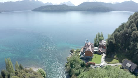 AERIAL---Andes-Mountains-and-Correntoso-Lake,-Neuquen,-Argentina,-rising-tilt-down