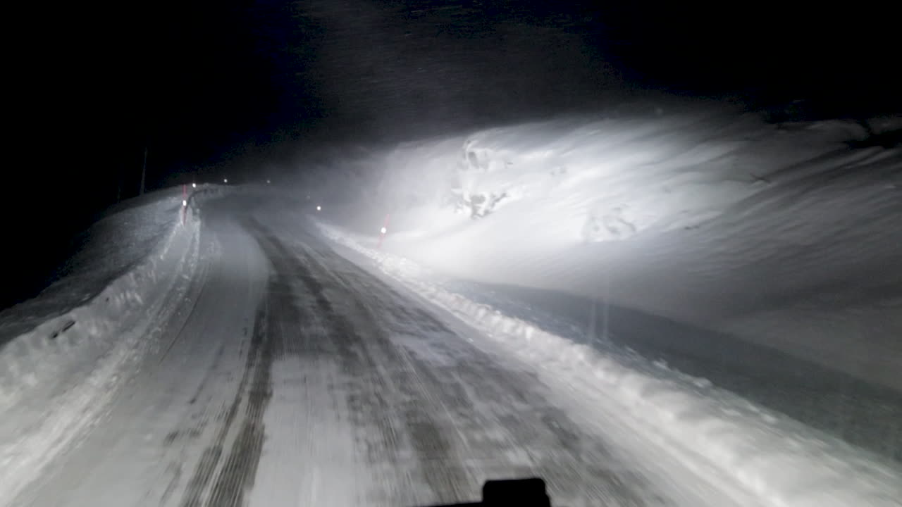 Driving through a blizzard at night