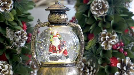 Snowglobe-with-Santa-Clauss-and-Christmas-decoration
