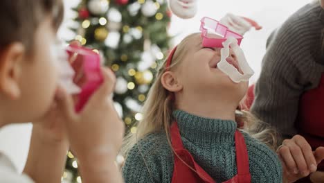 Handheld-video-of-children-having-fun-with--cookie-cutters