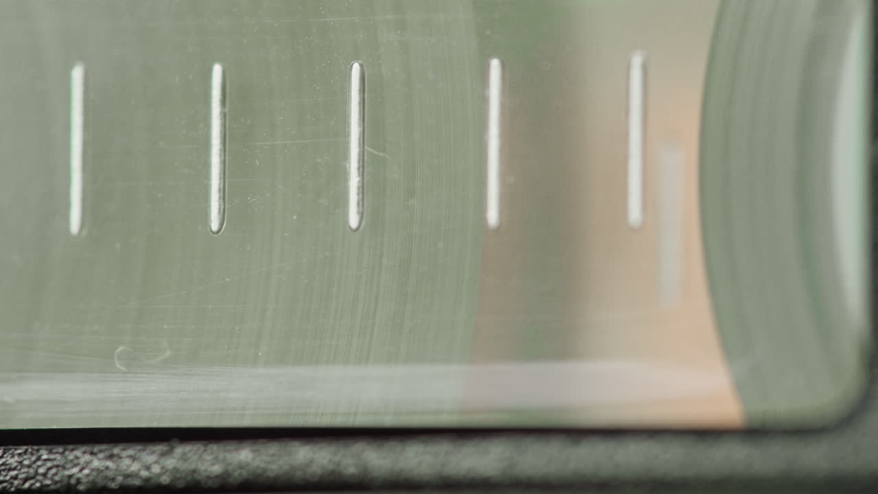 Close-up view of machine panel with slots