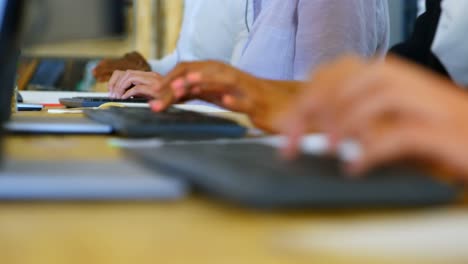 business executives working on computer in office 4k