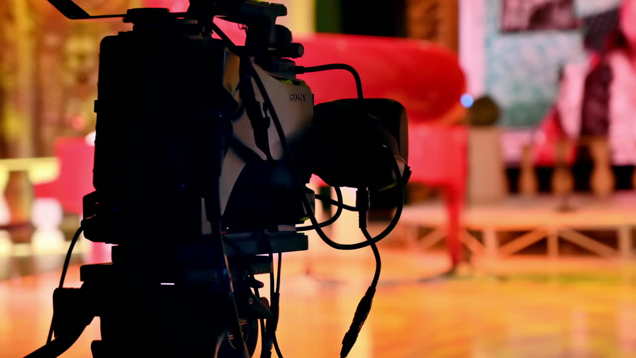 Professional camera filming on the backstage of a TV set