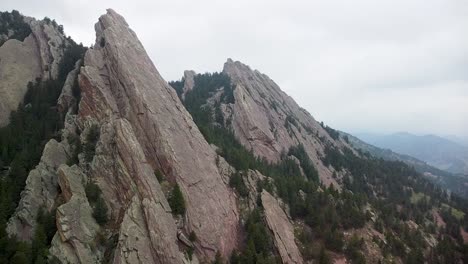 aerial orbit of flatiron rock formations in boulder, colorado