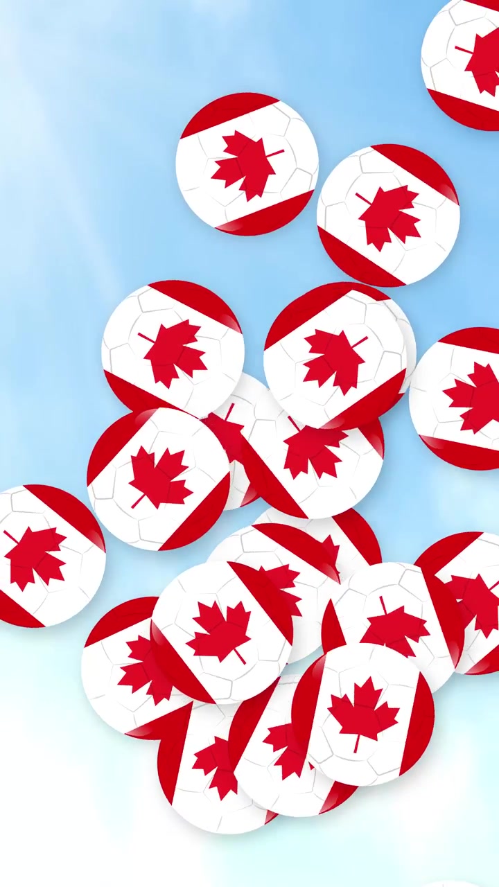 Des ballons de football arborant le drapeau canadien tombent verticalement sur fond de ciel bleu nuageux et lumineux.