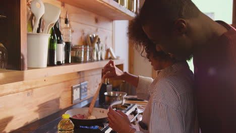 mixed race woman preparing breakfast at home