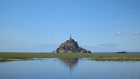 Drone-footage-unveils-Mont-Saint-Michel's-historic-charm-against-a-coastal-backd