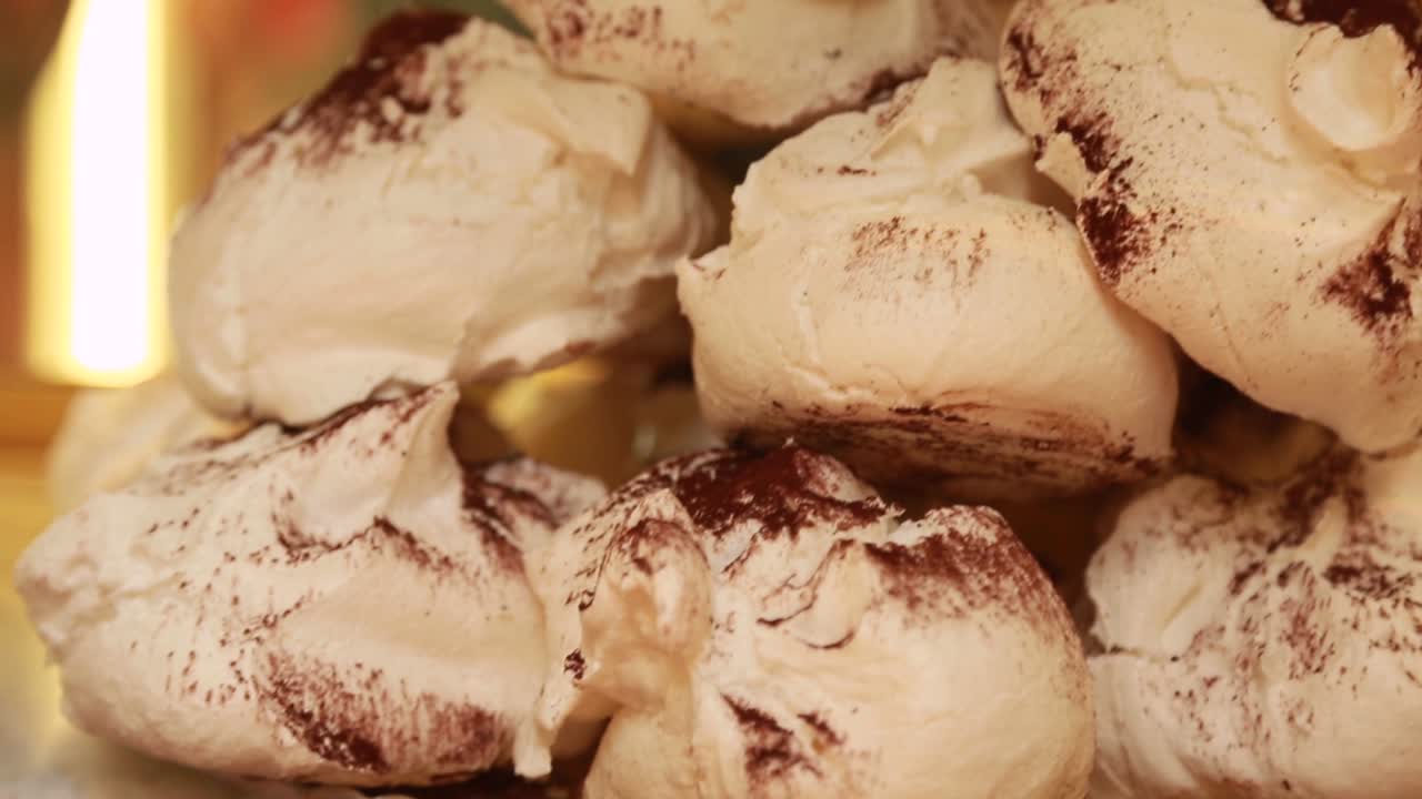 Giant sweet Italian meringues, at a local pastry shop in Venice, Italy