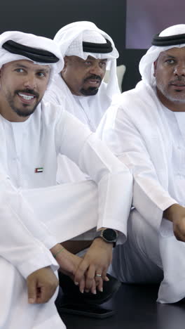 emirati men in discussion