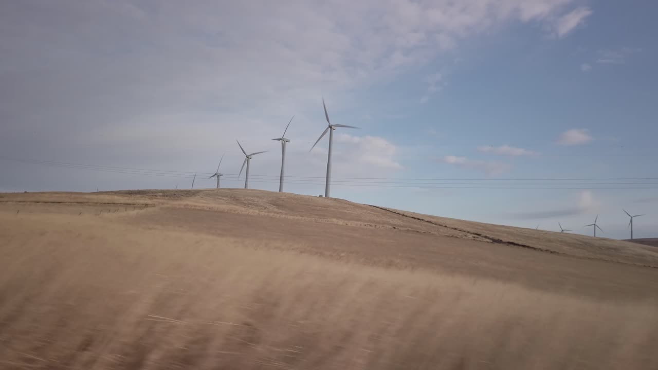 Wind Turbines on a Hilly Landscape