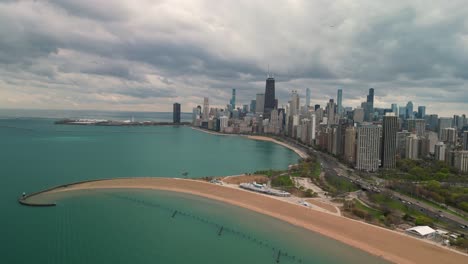 Aerial-view-landscape-of-North-Avenue-Beach-Pier,-and-downtown-Chicago