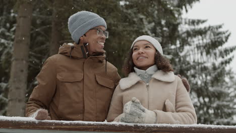 couple enjoying a snowy day