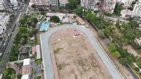 Drone-aerial-footage-of-people-working-out-running-Lima-the-capital-city-of-Peru-in-south-america-Mireflores-barranca