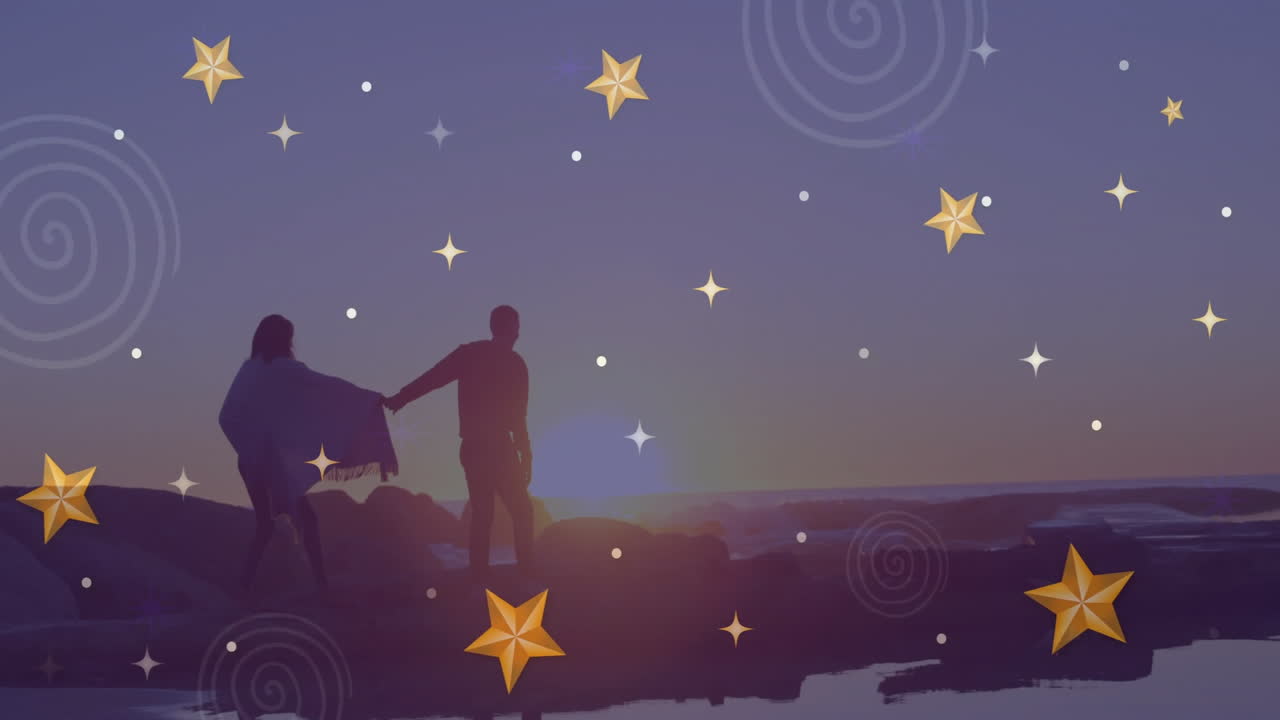 Silhouetted couple holding hands on beach with starry animation overlay
