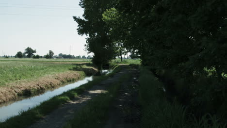 Northern-Italy-countryside,-dirt-road-in-the-shade