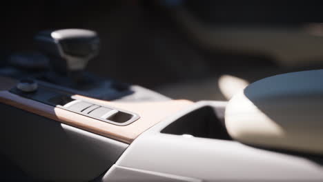 close up of a car interior with center console