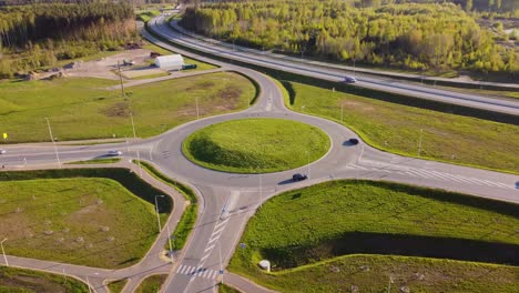 aerial view of katlakalns roundabout and suburban traffic in spring