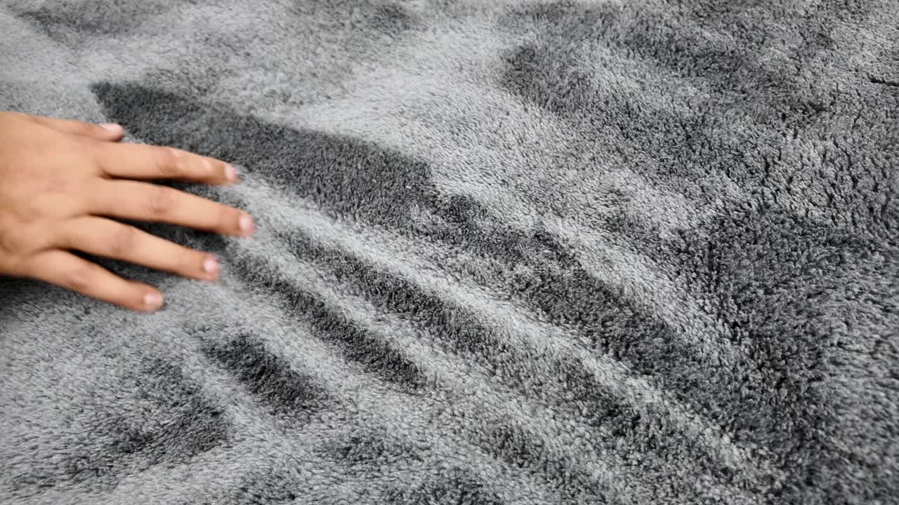 Grey Plush Carpet Texture with Hand