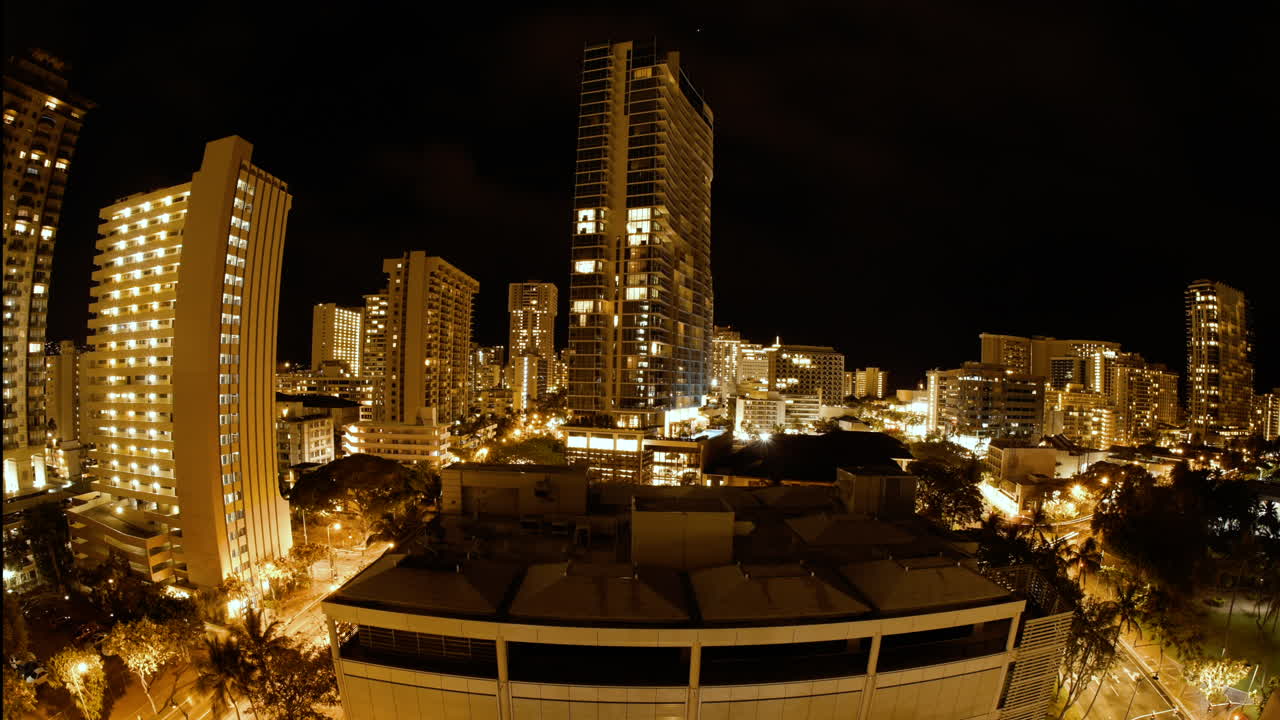 a timelapse in Waikiki region from a hotelFirework can be seen in the middle of the timelapse.