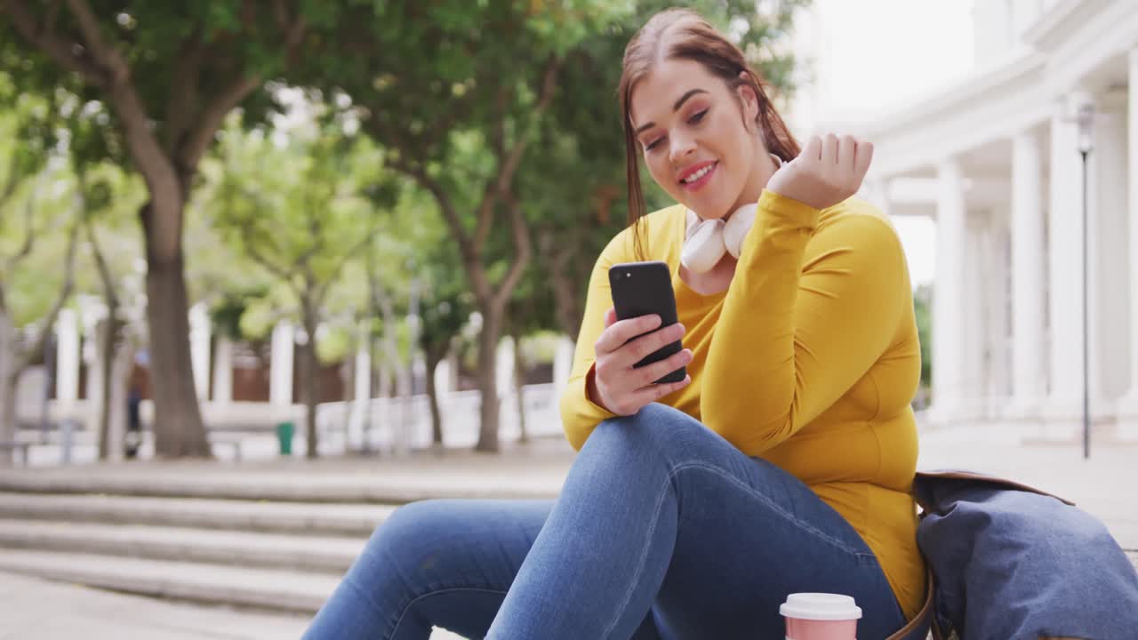 Young Caucasian woman chating on phone