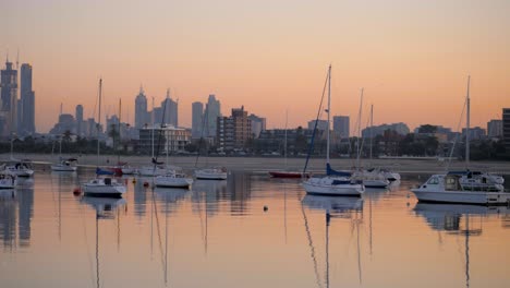 sailboats - yacht floating on habour st kilda pier city sunrise, melbourne