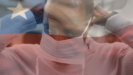 animación de la bandera de chile ondeando sobre un hombre que usa una máscara facial durante la pandemia de covid-19