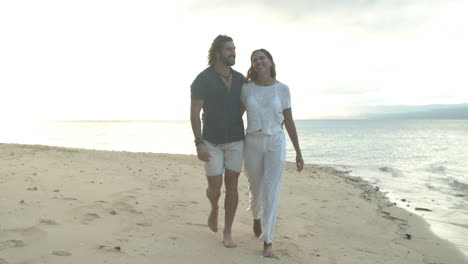 a happy young couple going for a relaxing walk