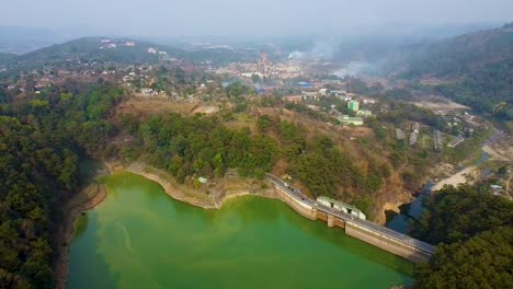 dam with pristine lake at the edge of mountain forests aerial shots at morning video is taken at umiyam lake shillong meghalaya india