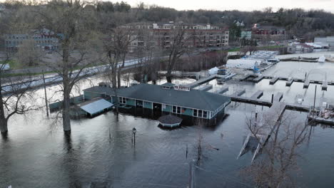 flooded marina restaurant half submerged underwater along st