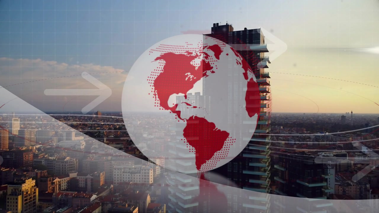 Gráfico de globo vermelho e branco surgindo gradualmente e girando lentamente, com sobreposições varrendo e revelando uma paisagem urbana ao pôr do sol