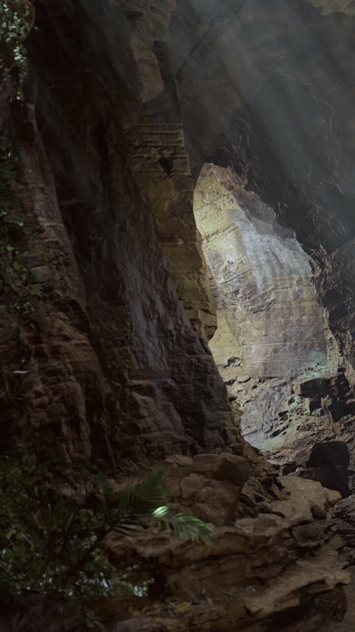 Shadows and light create patterns in deep cave in natural setting