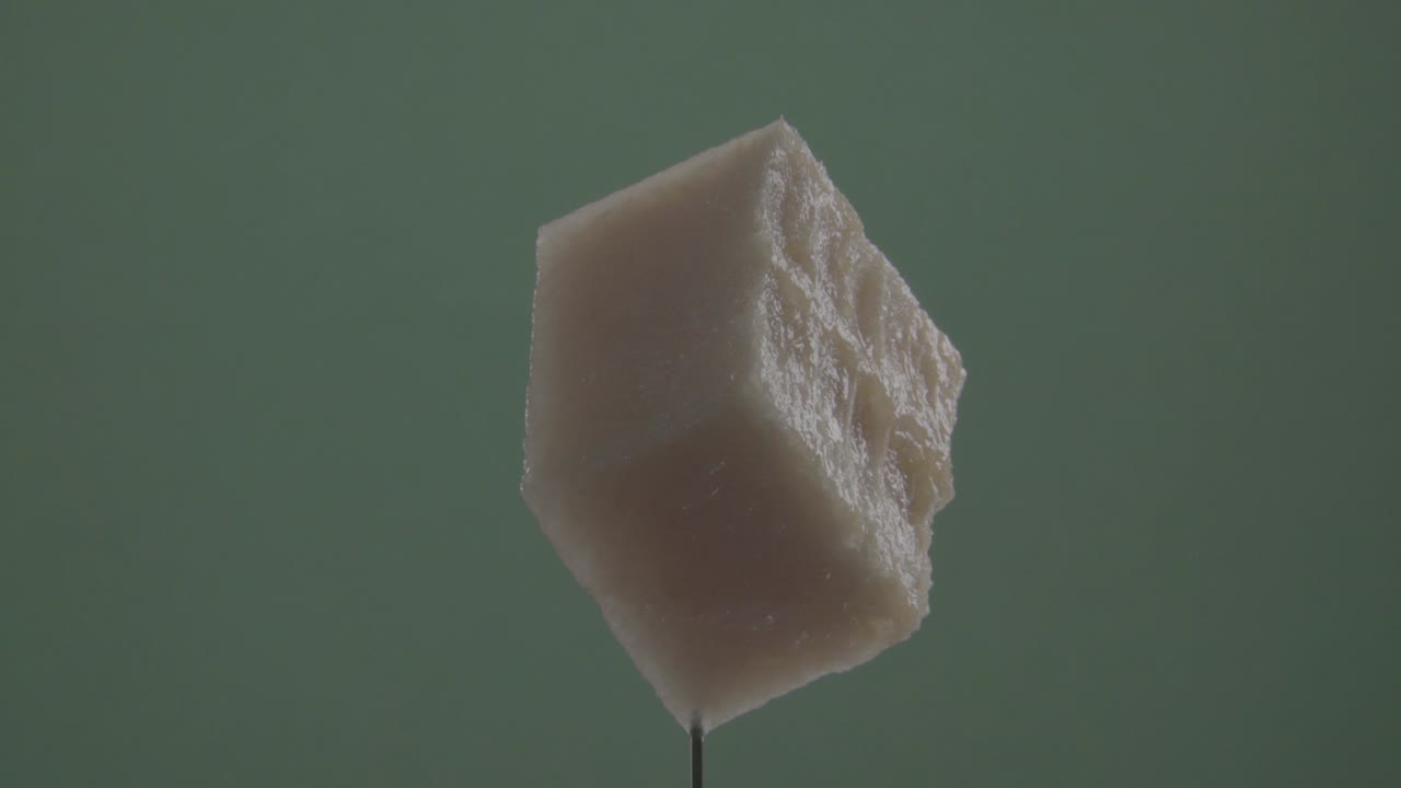 melón girando con bucle en pantalla verde para la llave de croma