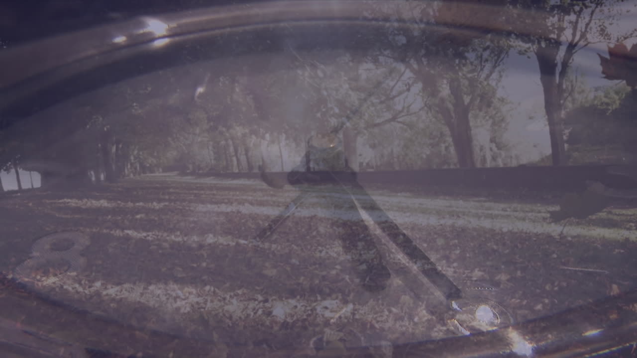 Animation of clock moving over leaves falling in park