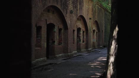 tomogashima island, ruins of red brick fortress on secluded island, japan