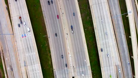 a high spinning aerial view of 20+ lanes, with moderate flowing traffic, at 60 frames