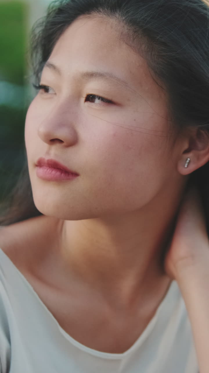 Close-up portrait of an Asian woman